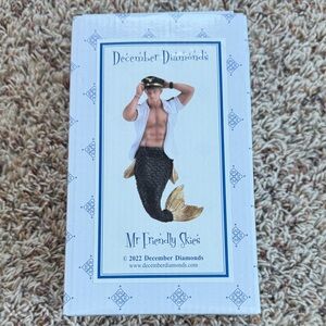 NIB Mr Friendly Skies Merman Ornament - Black and Gold